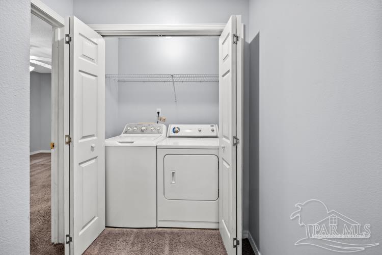 1009 Simpson Street Pensacola, FL 32526 - Photo 9 of 18 a utility room with dryer and washer