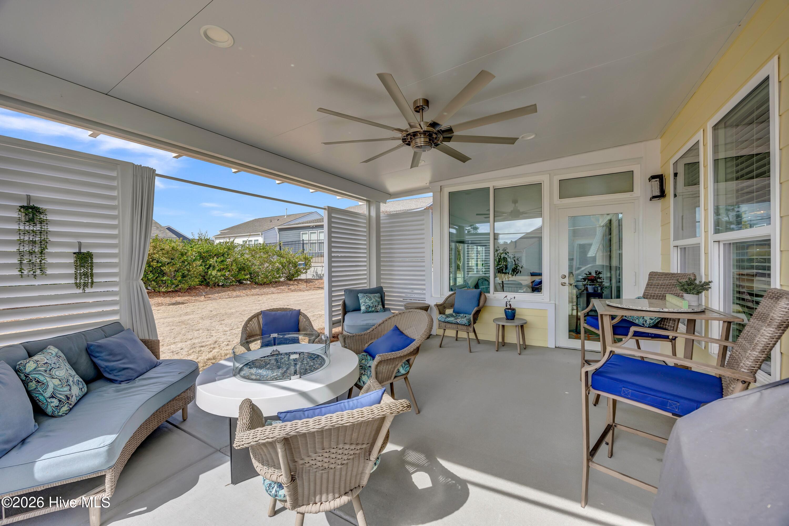 4008 Ruddy Duck Way Wilmington, NC 28412 - Photo 23 of 51 Extended, covered patio with gas pit...