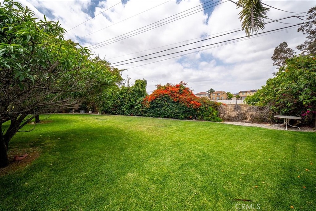 6481 Dos Rios Road Downey, CA 90240 - Photo 14 of 27 a view of a yard with a fountain