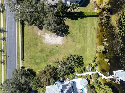 a vase of flowers sitting on a table next to a window