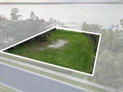 a view of a small yard from a balcony