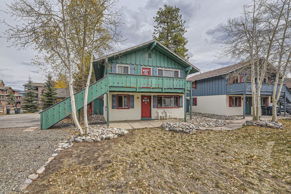 709 Frisco Street, Unit 67 Frisco, CO 80443 - Photo 2 of 27 a front view of a house with a yard