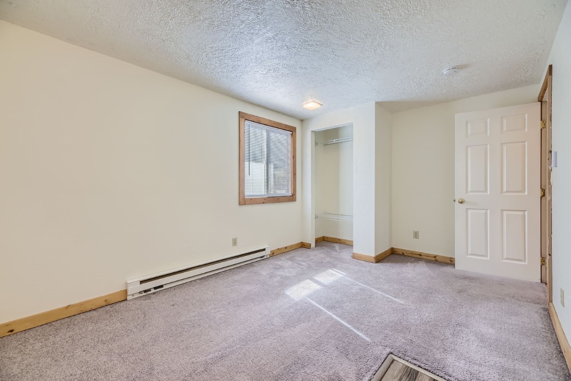 709 Frisco Street, Unit 67 Frisco, CO 80443 - Photo 22 of 27 an empty room with windows