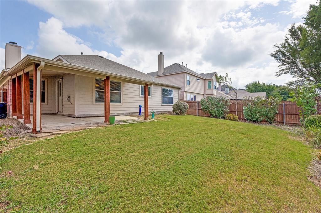 4008 Drexmore Road Fort Worth, TX 76244 - Photo 18 of 23 Fenced yard with landscaping