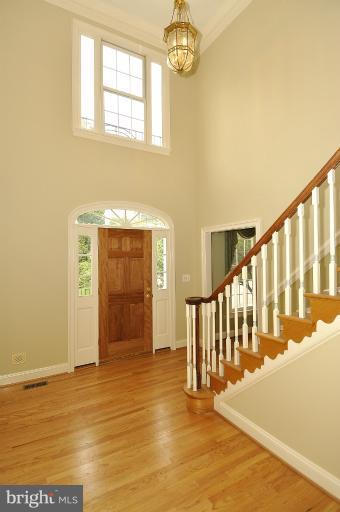 6912 Rannoch Road Bethesda, MD 20817 - Photo 8 of 30 a view of an entryway with wooden floor