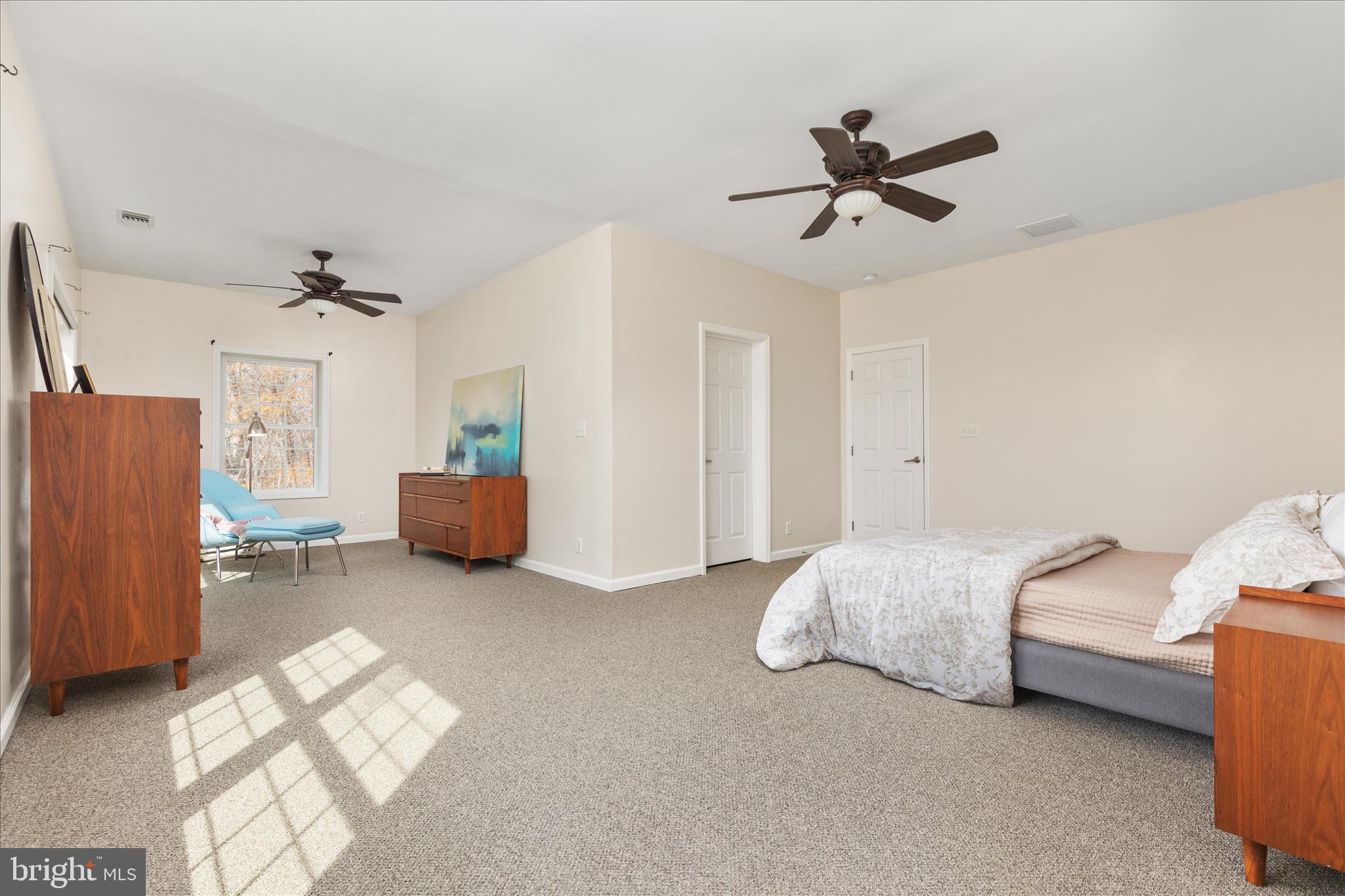 283 Rock Ridge Road Front Royal, VA 22630 - Photo 21 of 64 a bed room with a bed and a ceiling fan