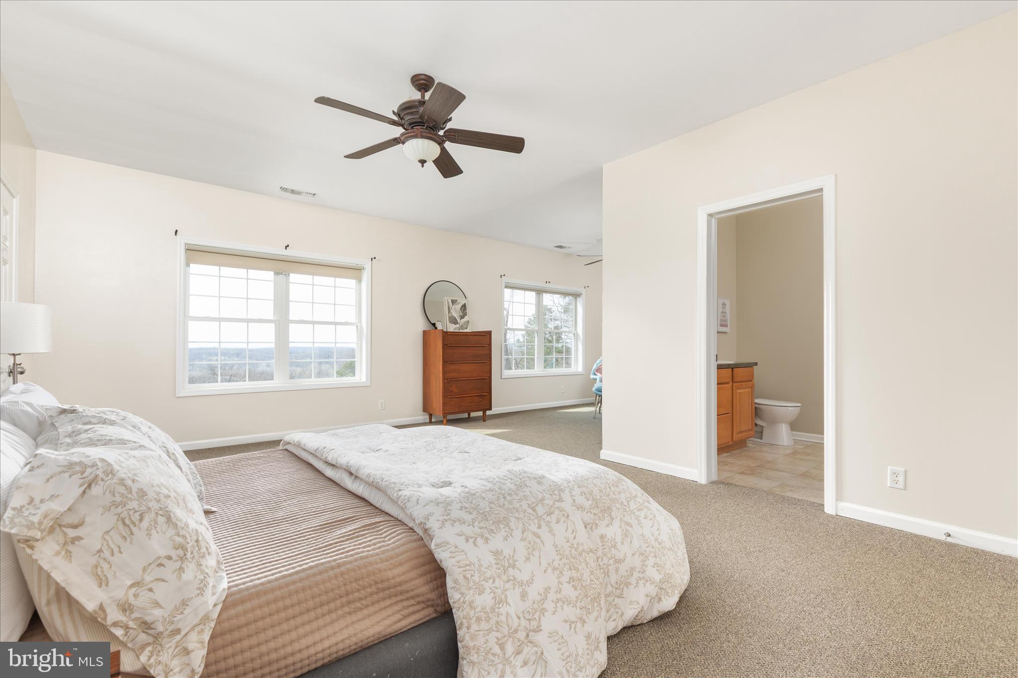 283 Rock Ridge Road Front Royal, VA 22630 - Photo 22 of 64 a spacious bedroom with a bed and a window