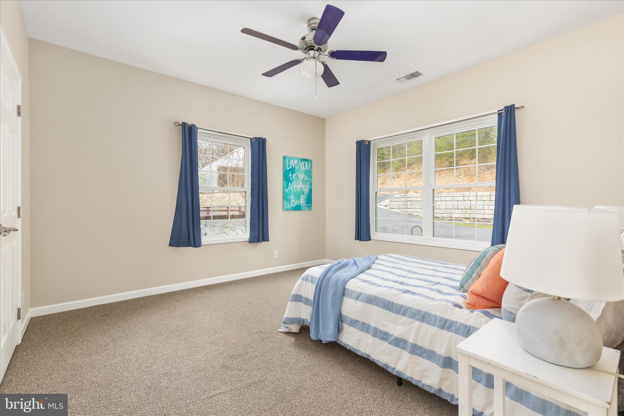 283 Rock Ridge Road Front Royal, VA 22630 - Photo 29 of 64 a bedroom with a bed and a large window
