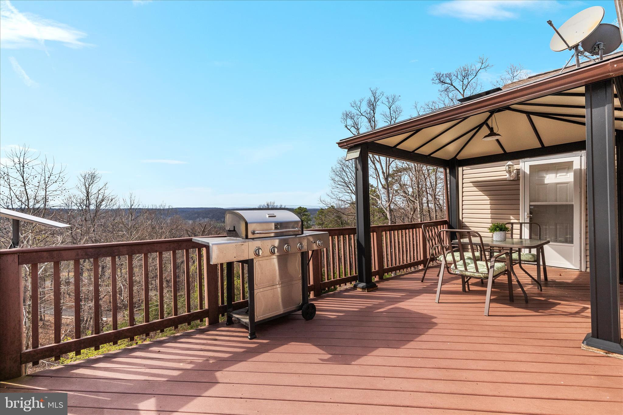 283 Rock Ridge Road Front Royal, VA 22630 - Photo 42 of 64 Deck off living room and primary bedroom-