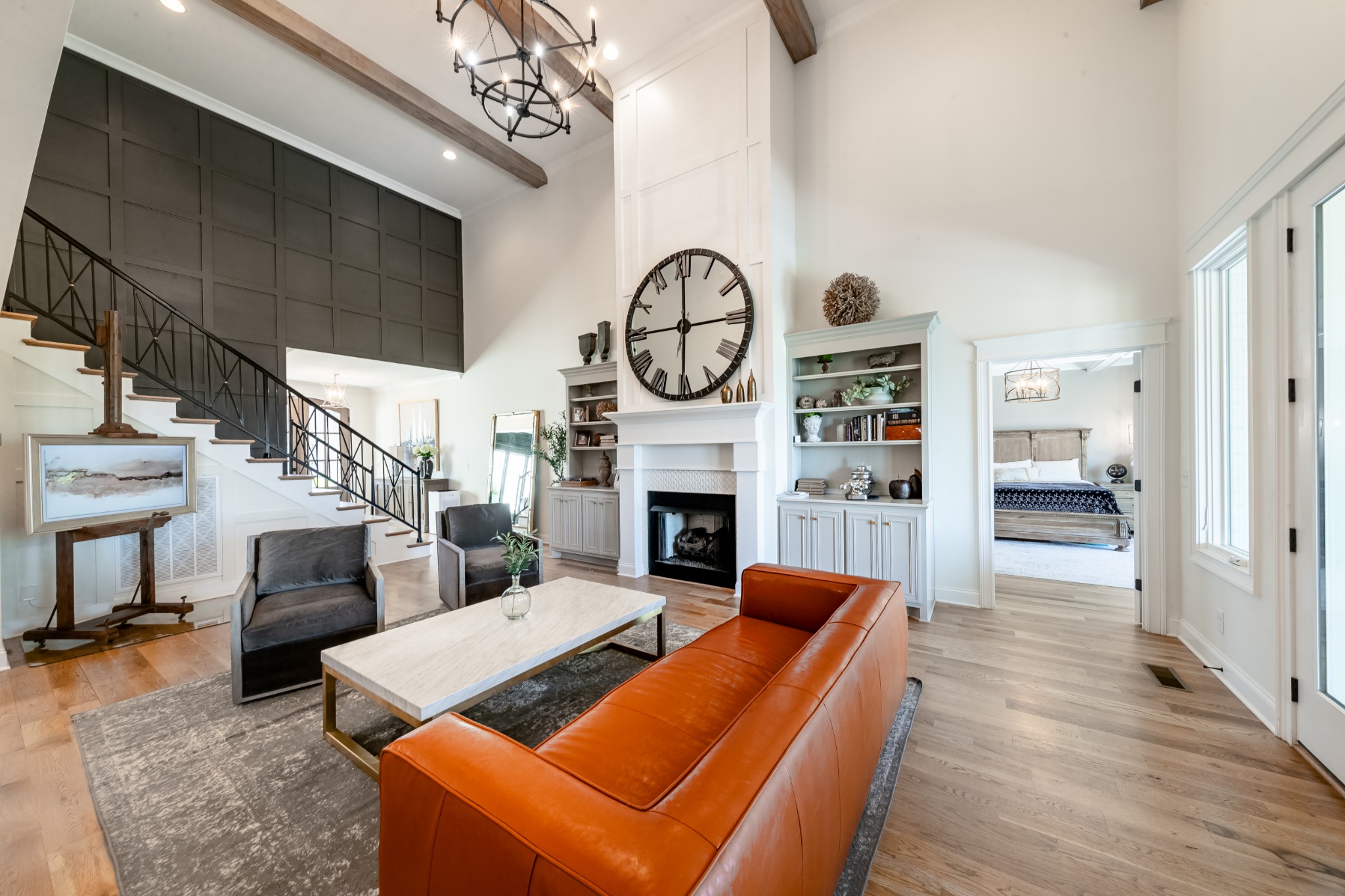 304 Charleston Street Lebanon, TN 37087 - Photo 11 of 51 a living room with furniture a fireplace and a chandelier