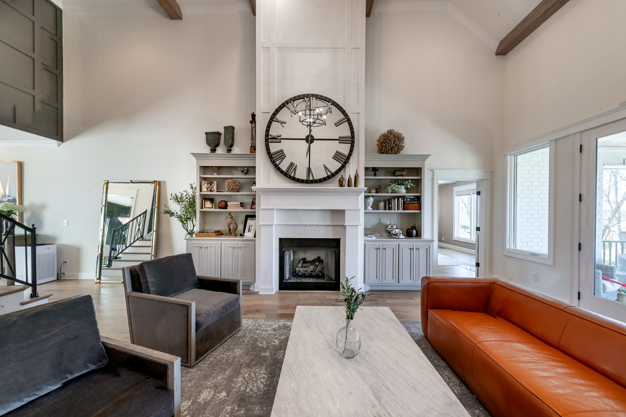 304 Charleston Street Lebanon, TN 37087 - Photo 12 of 51 a living room with furniture a clock and a fireplace