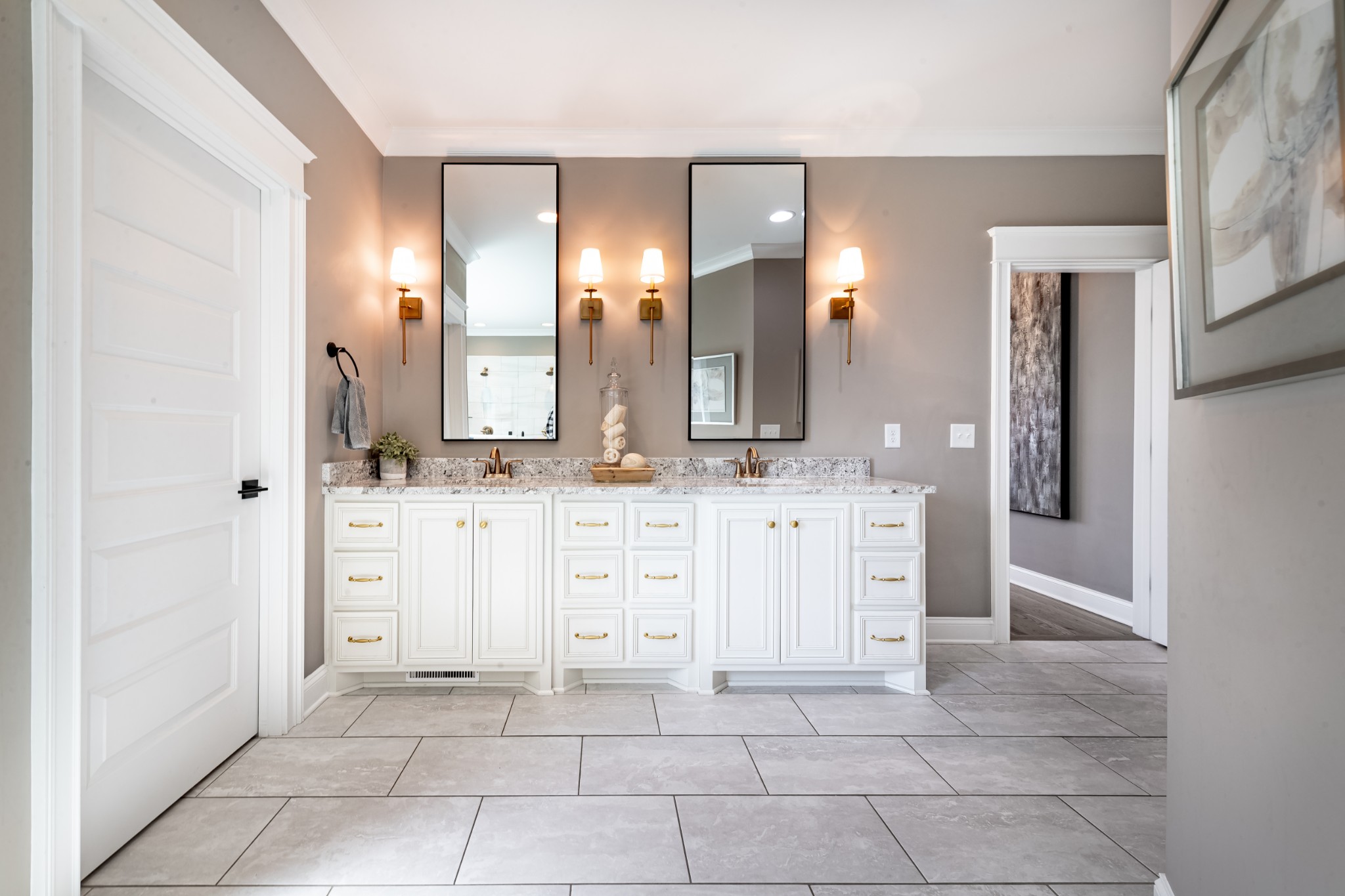 304 Charleston Street Lebanon, TN 37087 - Photo 19 of 51 a bathroom with a sink a mirror and a shower