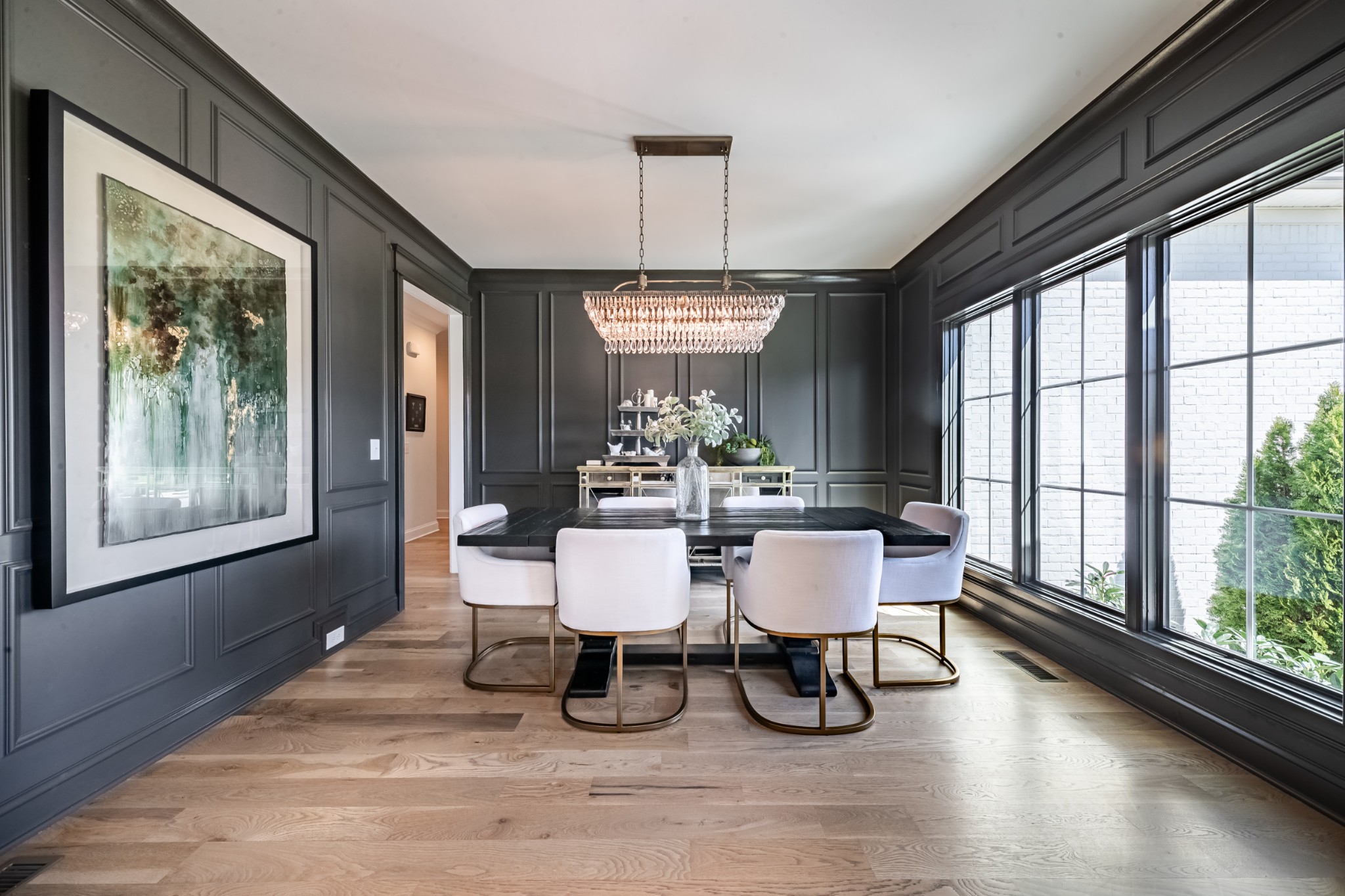 304 Charleston Street Lebanon, TN 37087 - Photo 26 of 51 a dining room with furniture a chandelier and wooden floor