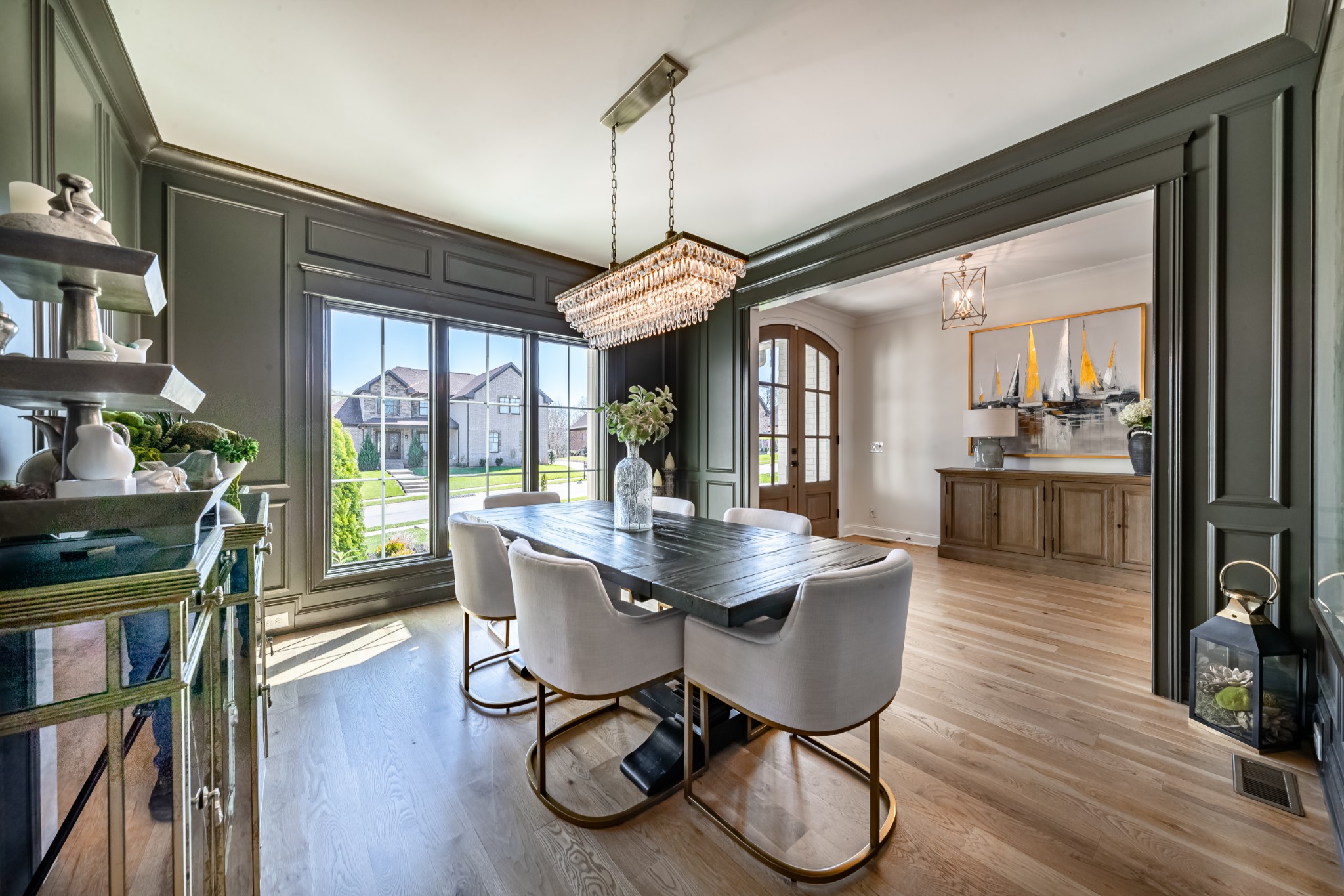 304 Charleston Street Lebanon, TN 37087 - Photo 27 of 51 a dining room with furniture a chandelier and wooden floor
