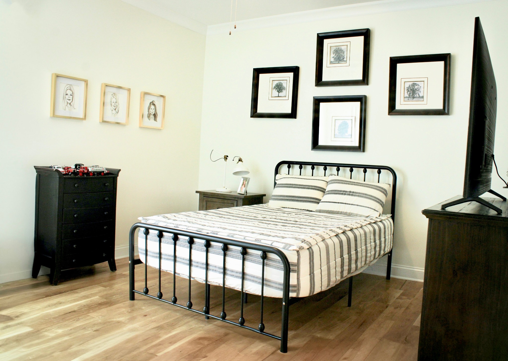 304 Charleston Street Lebanon, TN 37087 - Photo 28 of 51 a bedroom with a bed and wooden floor