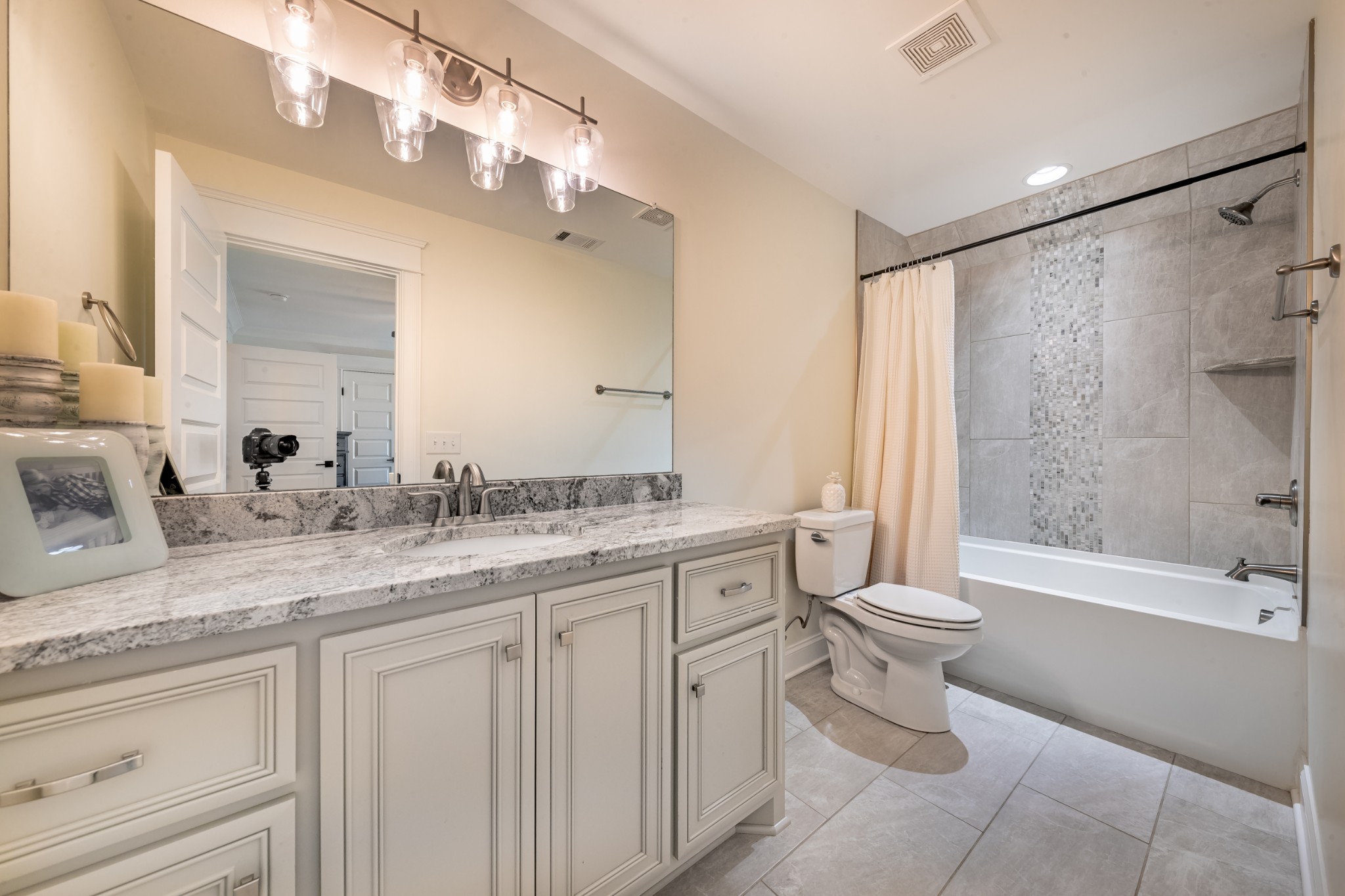 304 Charleston Street Lebanon, TN 37087 - Photo 29 of 51 a bathroom with a granite countertop sink toilet and shower