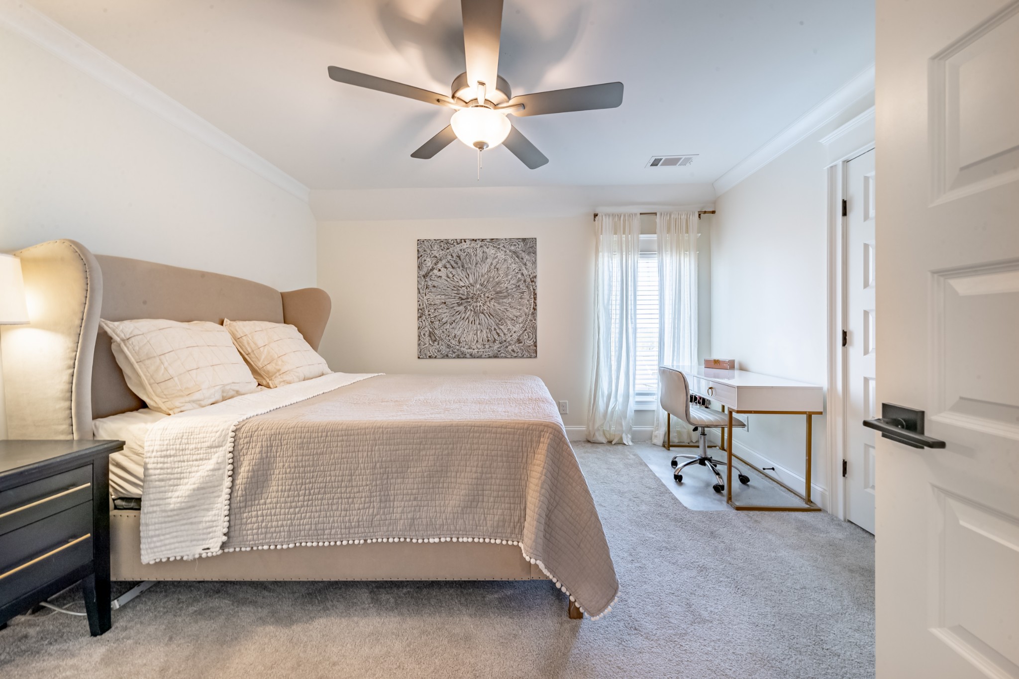 304 Charleston Street Lebanon, TN 37087 - Photo 33 of 51 a spacious bedroom with a bed and a table in it