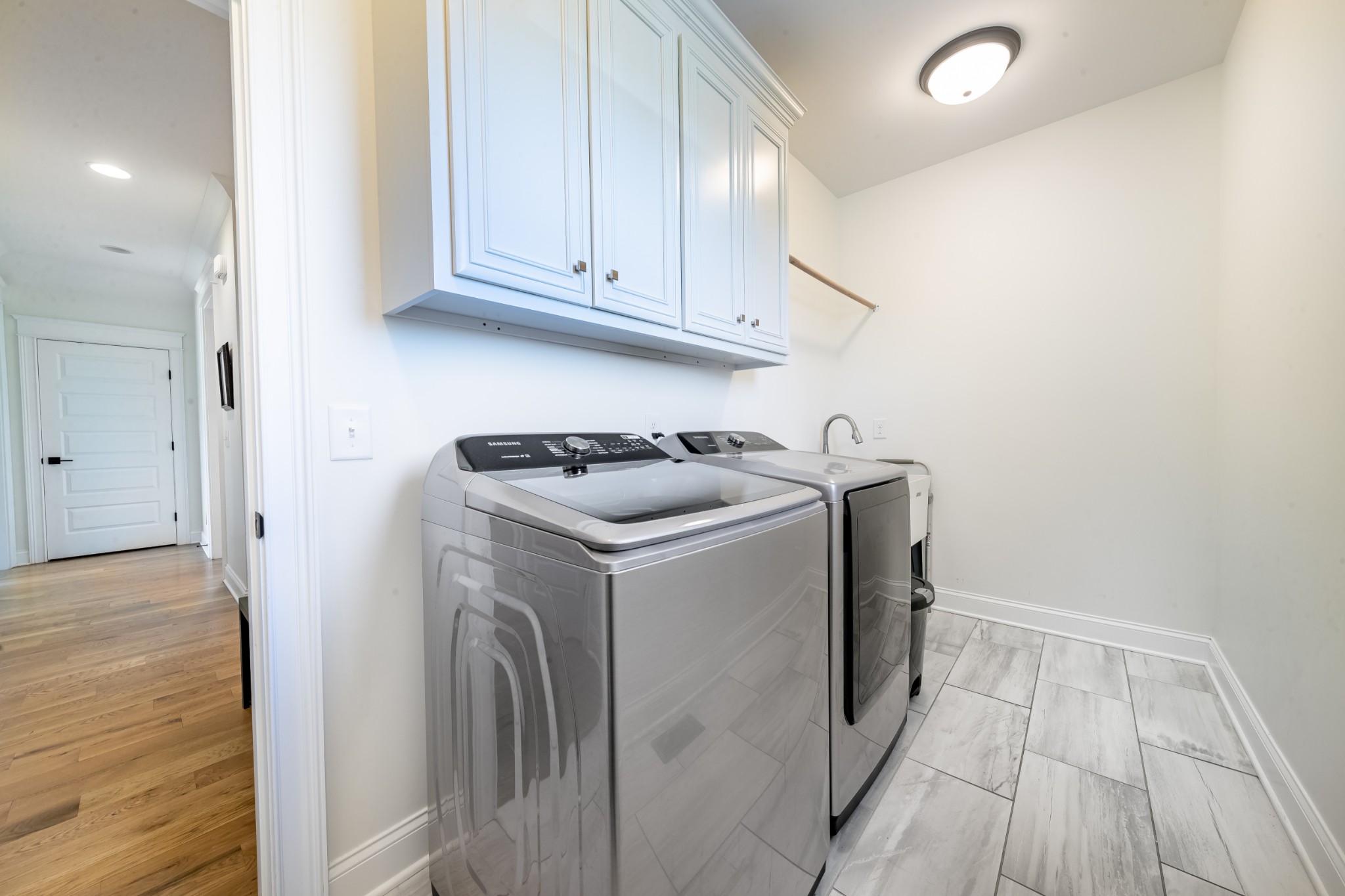 304 Charleston Street Lebanon, TN 37087 - Photo 40 of 51 a utility room with wooden floor washer and dryer