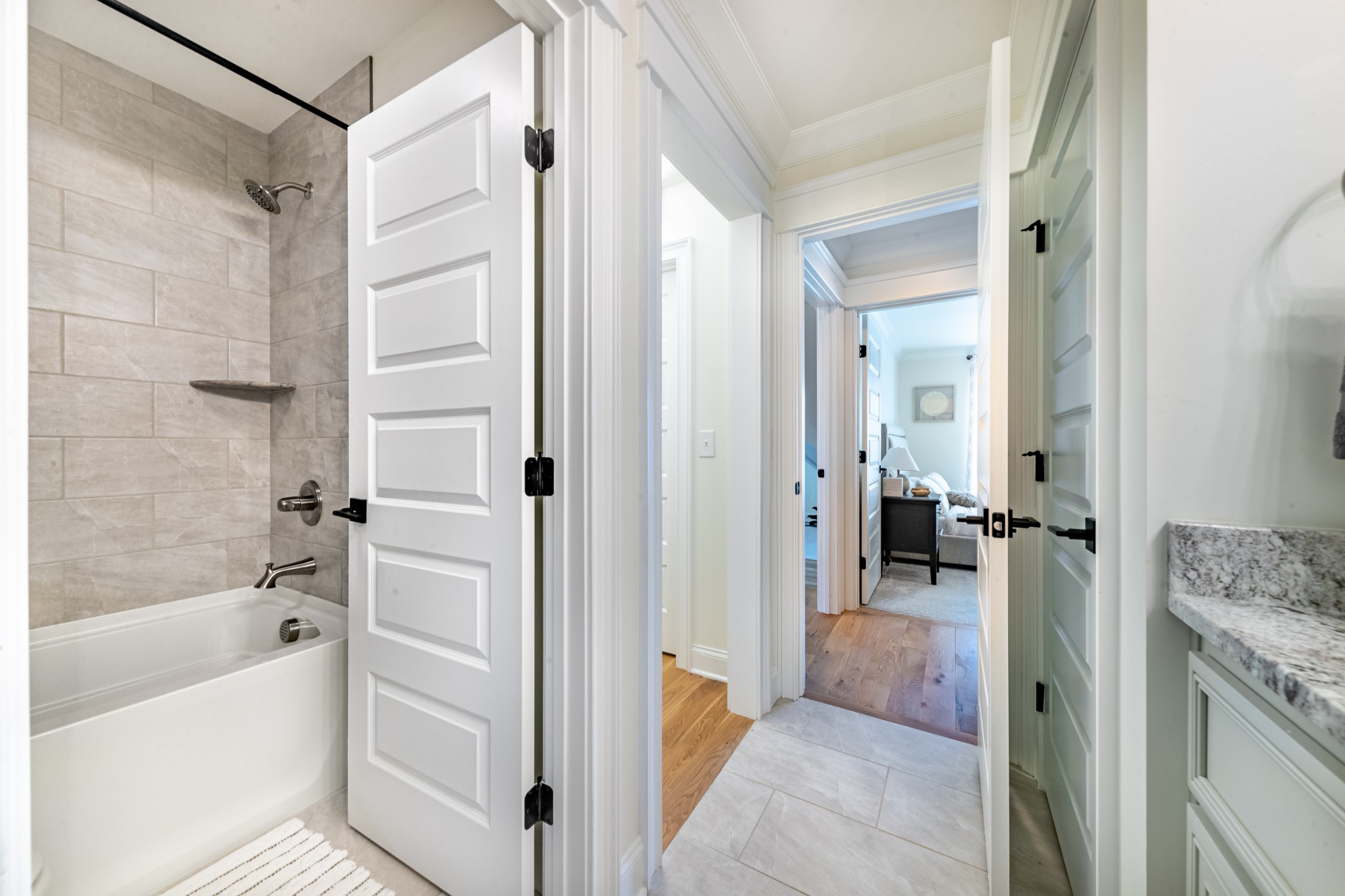 304 Charleston Street Lebanon, TN 37087 - Photo 41 of 51 a bathroom with a tub shower vanity and a sink