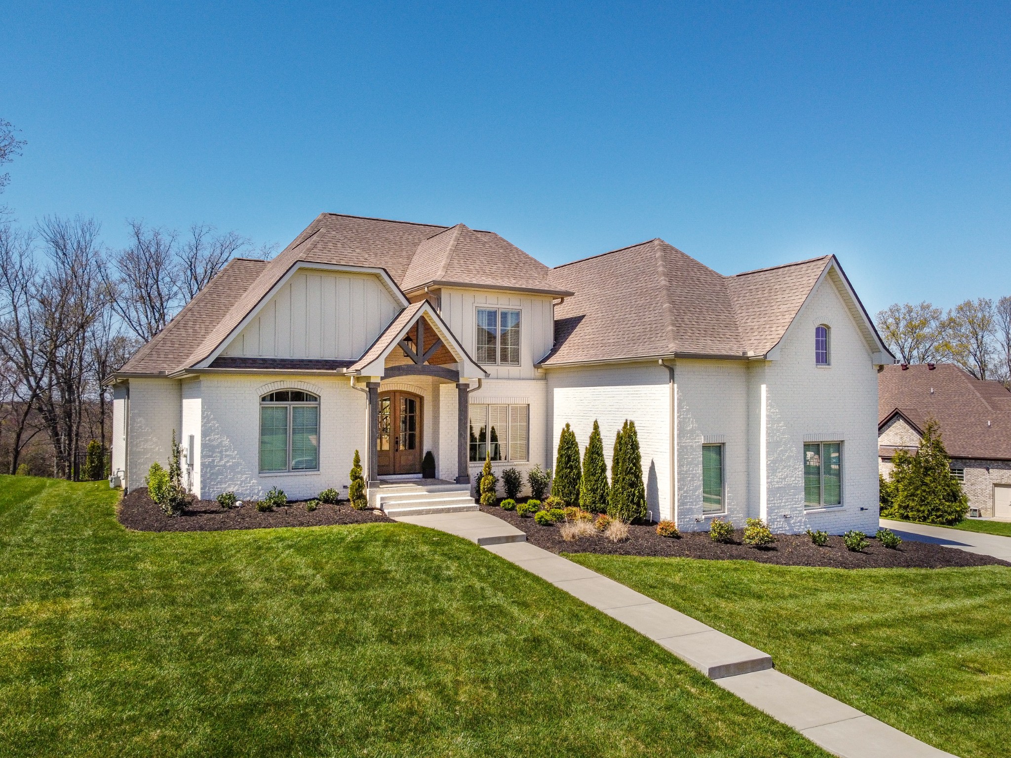 304 Charleston Street Lebanon, TN 37087 - Photo 43 of 51 a front view of a house with a yard