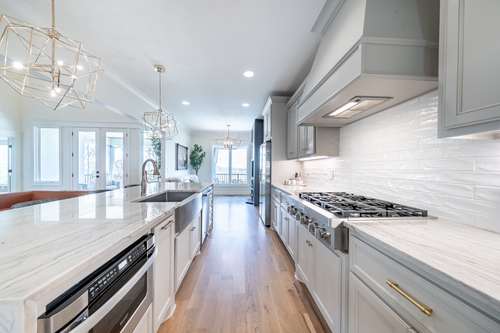 304 Charleston Street Lebanon, TN 37087 - Photo 5 of 51 a large kitchen with granite countertop a stove and a sink
