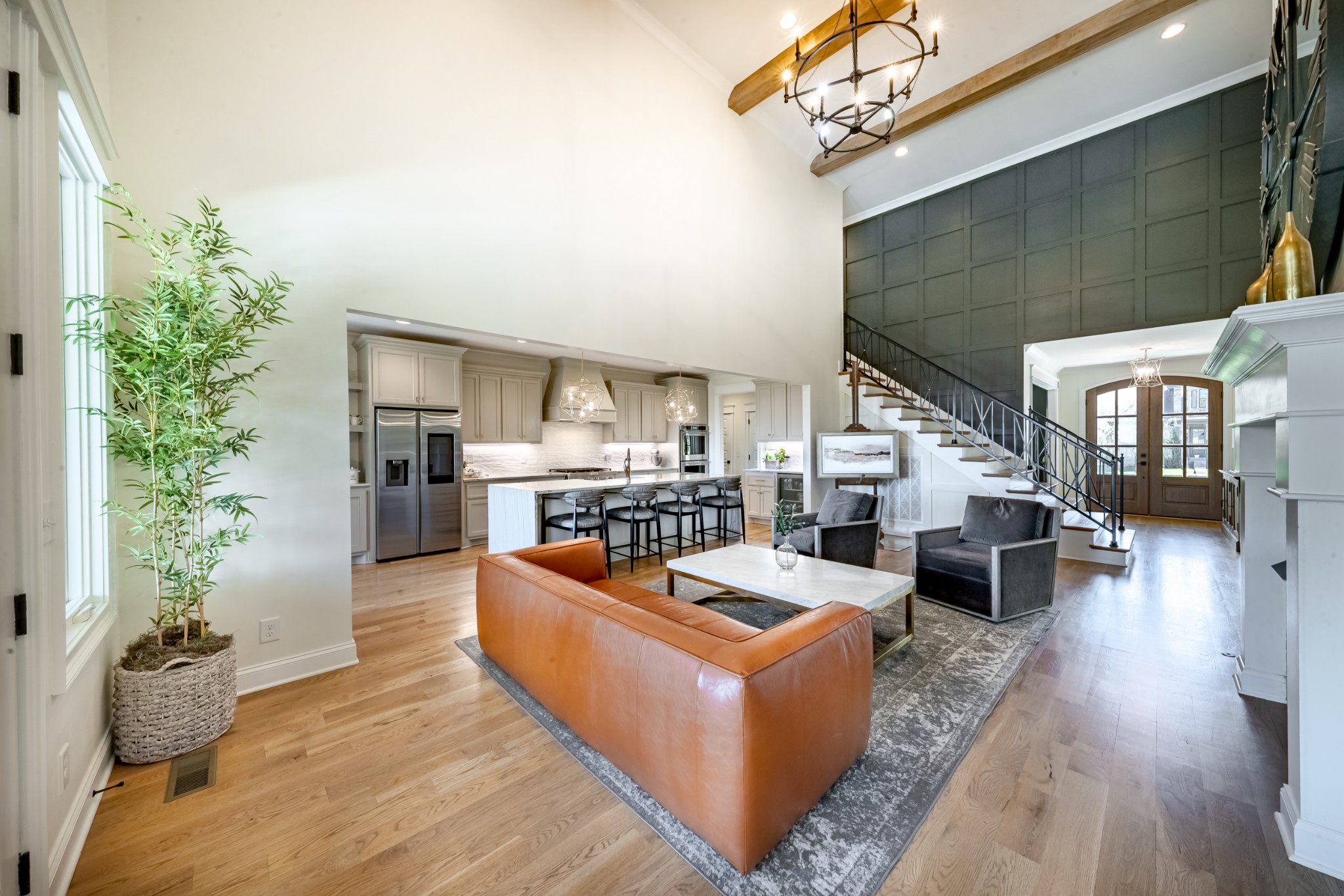 304 Charleston Street Lebanon, TN 37087 - Photo 10 of 51 a living room with furniture potted plant and kitchen view