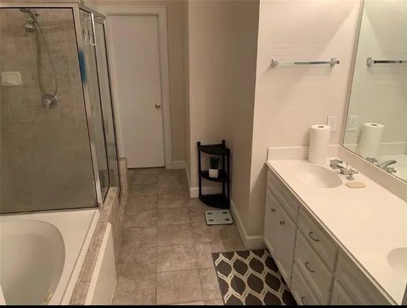 a kitchen with a refrigerator sink and stove