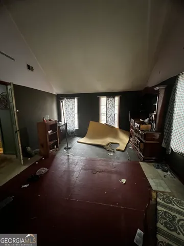 a room with toys and wooden floor