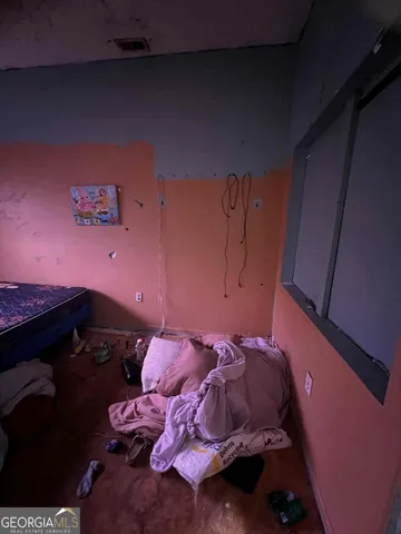 a room with toys and white walls