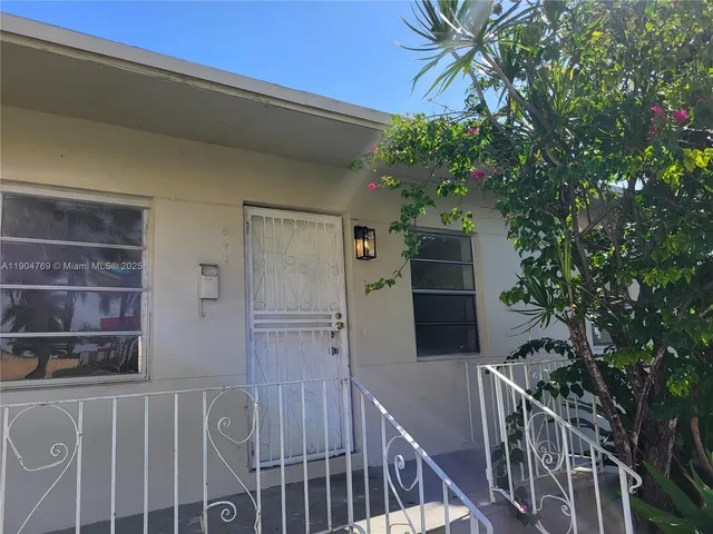 a view of a house with a deck