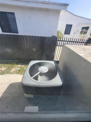 a picture of a couch in a kitchen