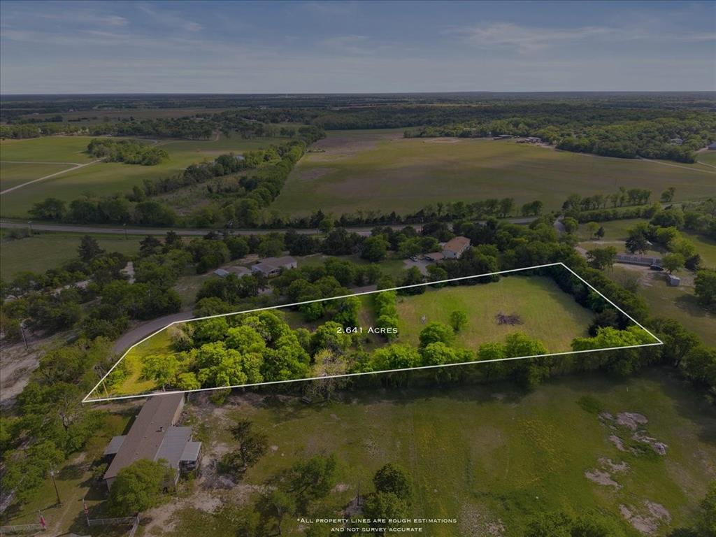145 Wild Road Van Alstyne, TX 75495 - Photo 2 of 5 an aerial view of lake