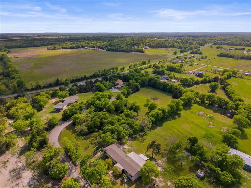 145 Wild Road Van Alstyne, TX 75495 - Photo 3 of 5 a view of lake and mountain view