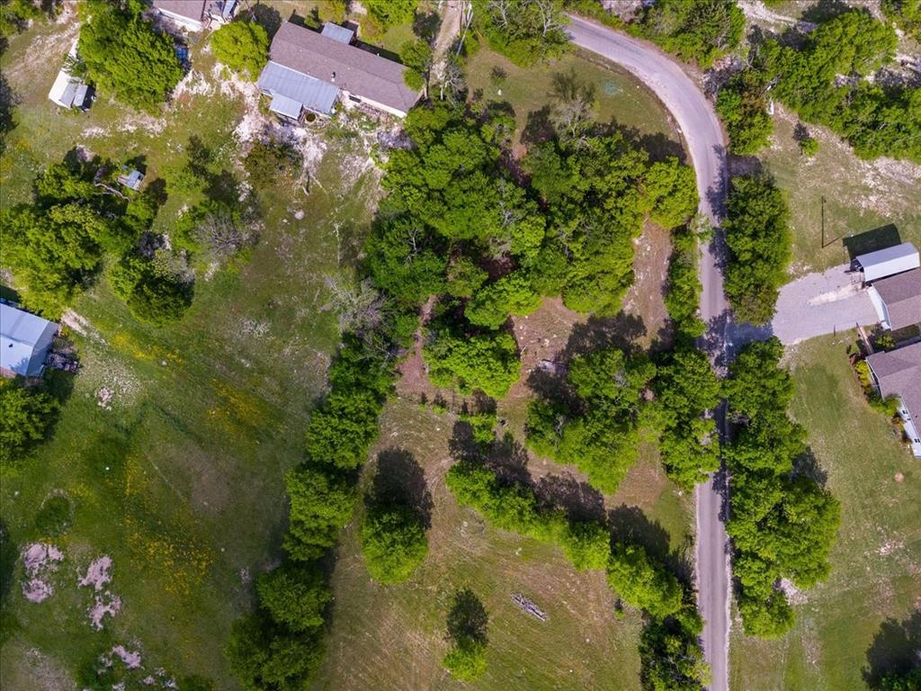 145 Wild Road Van Alstyne, TX 75495 - Photo 4 of 5 an aerial view of a house with a yard