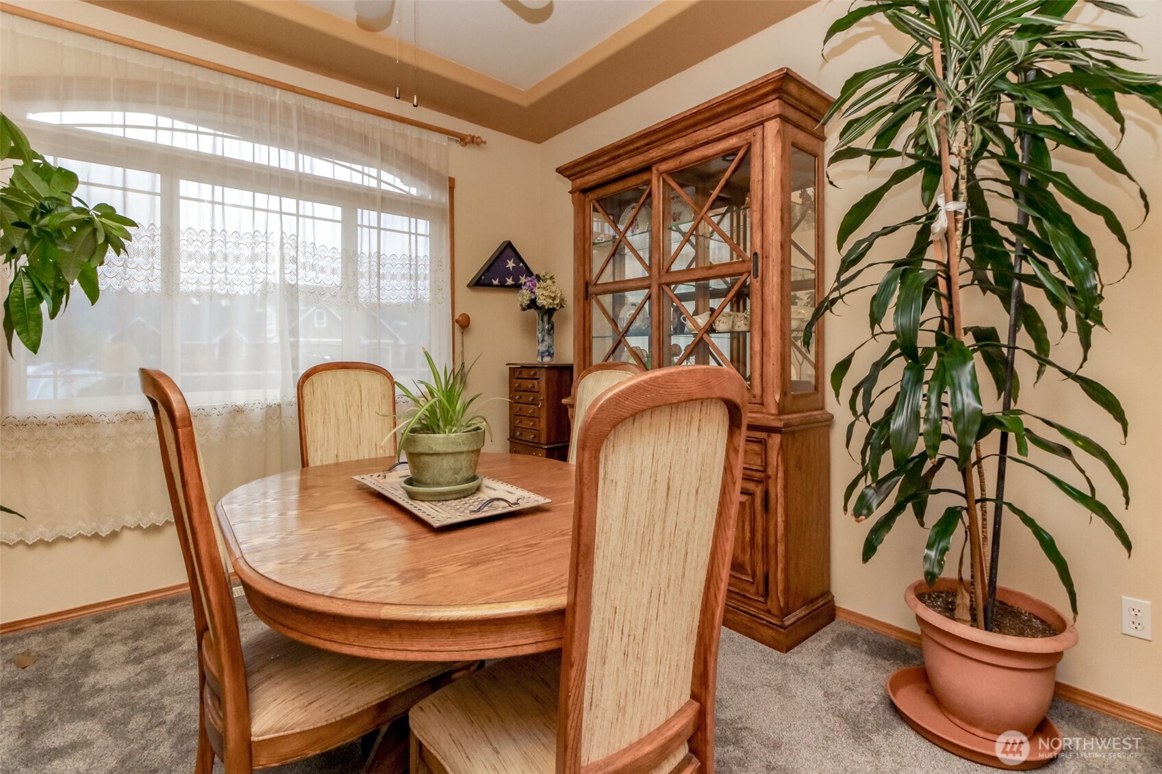 15405 148th Ave Court East Orting, WA 98360 - Photo 13 of 39 a view of a dining room with furniture and window