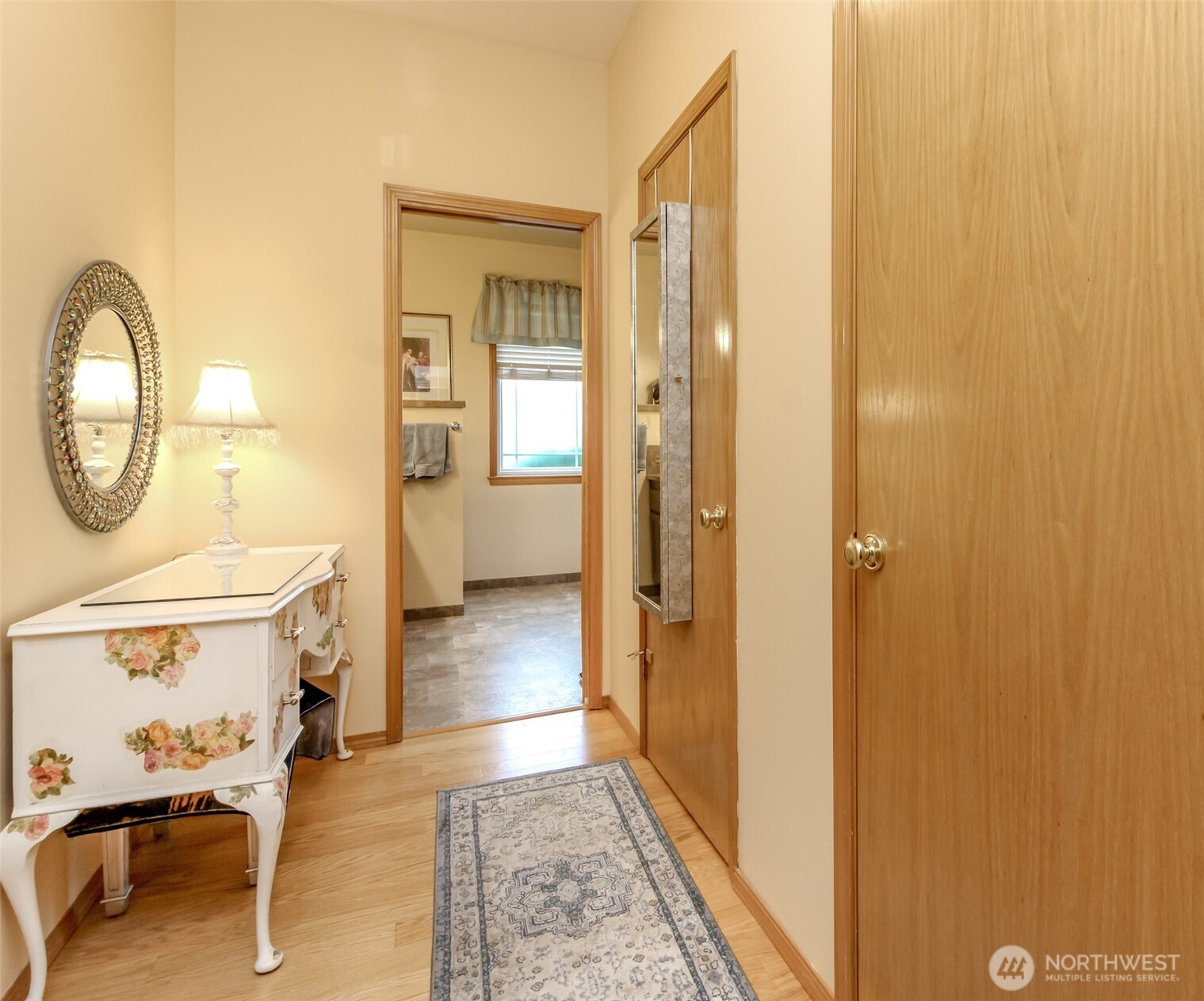 15405 148th Ave Court East Orting, WA 98360 - Photo 14 of 39 a view of a hallway with furniture and a mirror