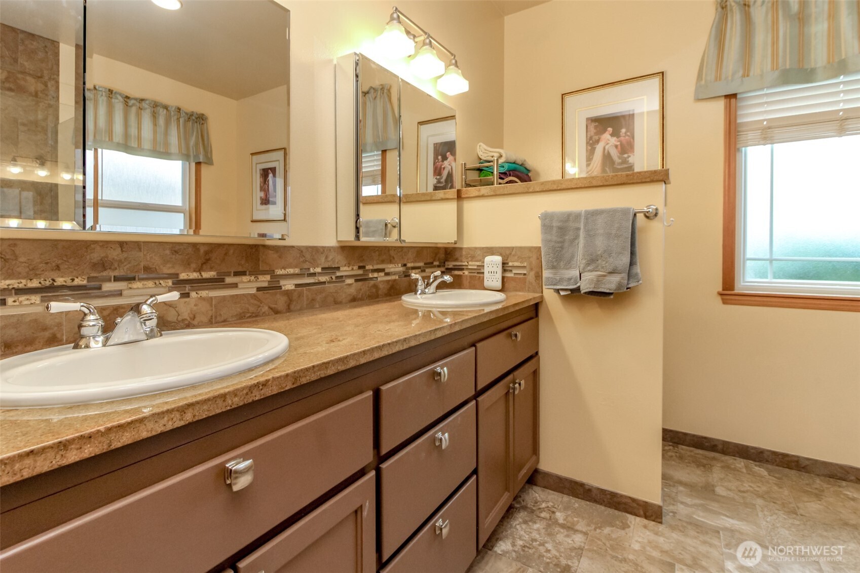 15405 148th Ave Court East Orting, WA 98360 - Photo 16 of 39 a bathroom with a sink and a mirror