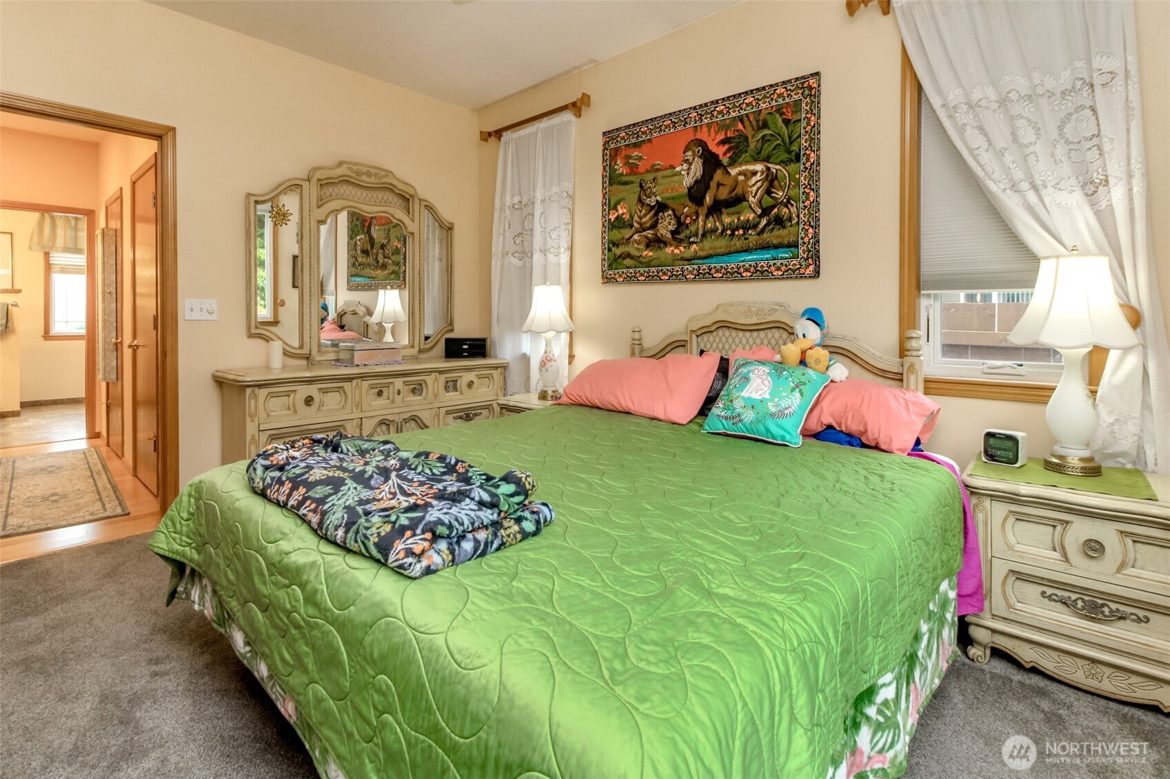 15405 148th Ave Court East Orting, WA 98360 - Photo 18 of 39 a bedroom with a bed mirror and window