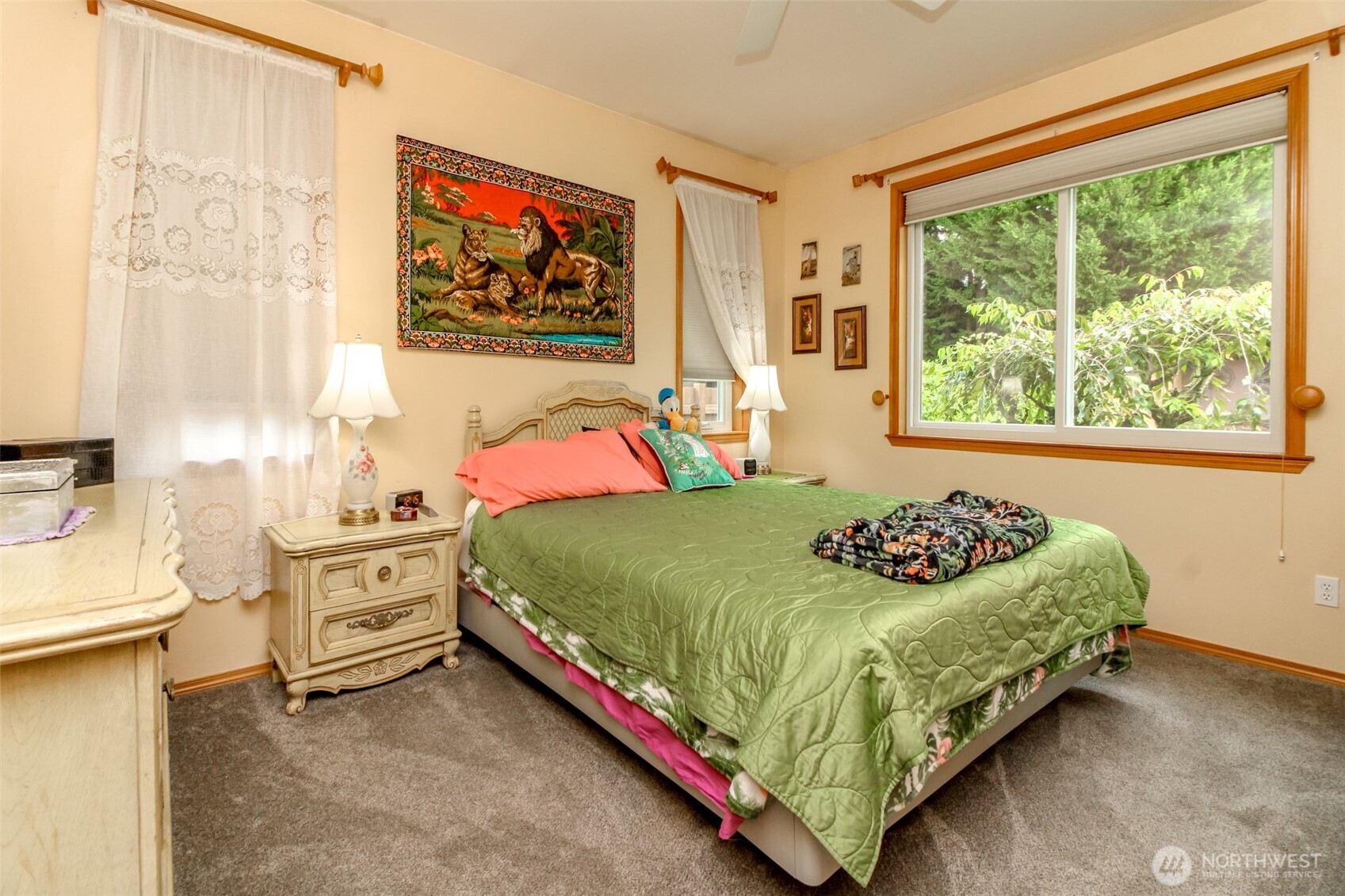 15405 148th Ave Court East Orting, WA 98360 - Photo 19 of 39 a bedroom with a bed and a painting on the wall