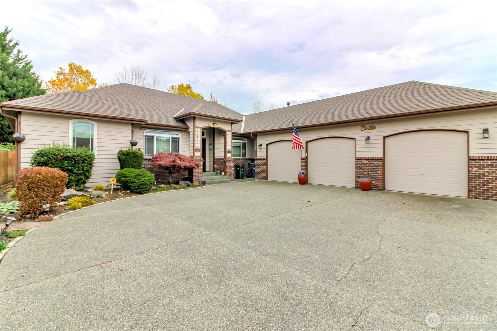 15405 148th Ave Court East Orting, WA 98360 - Photo 2 of 39 front view of house with potted plants