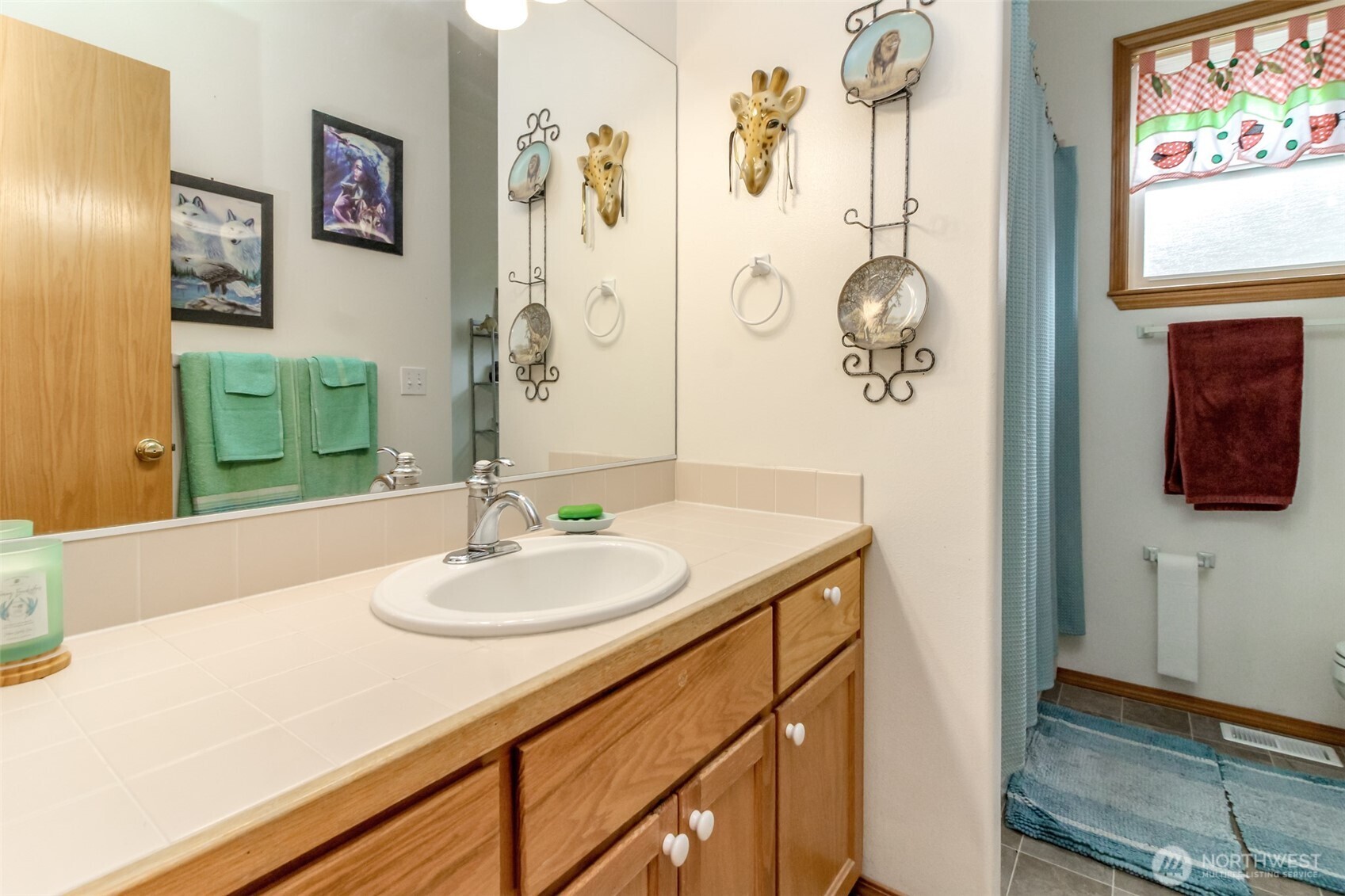 15405 148th Ave Court East Orting, WA 98360 - Photo 22 of 39 a bathroom with a sink and a mirror