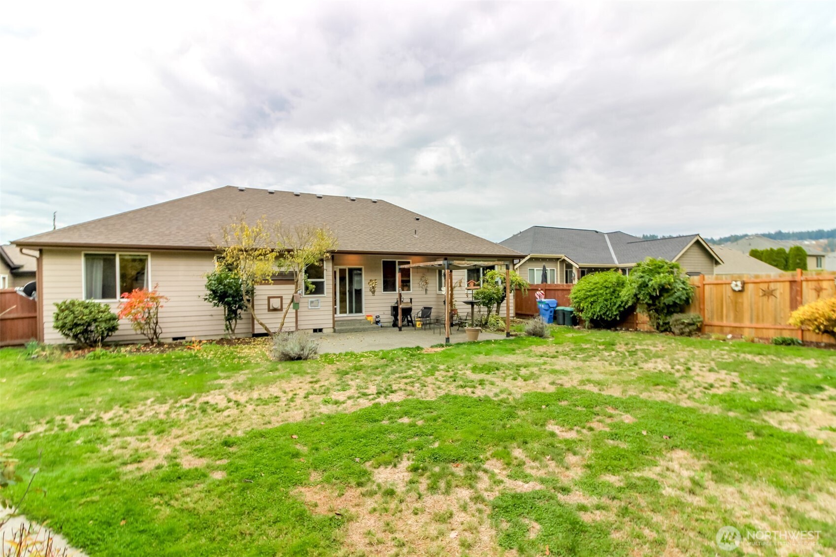 15405 148th Ave Court East Orting, WA 98360 - Photo 27 of 39 a front view of a house with garden