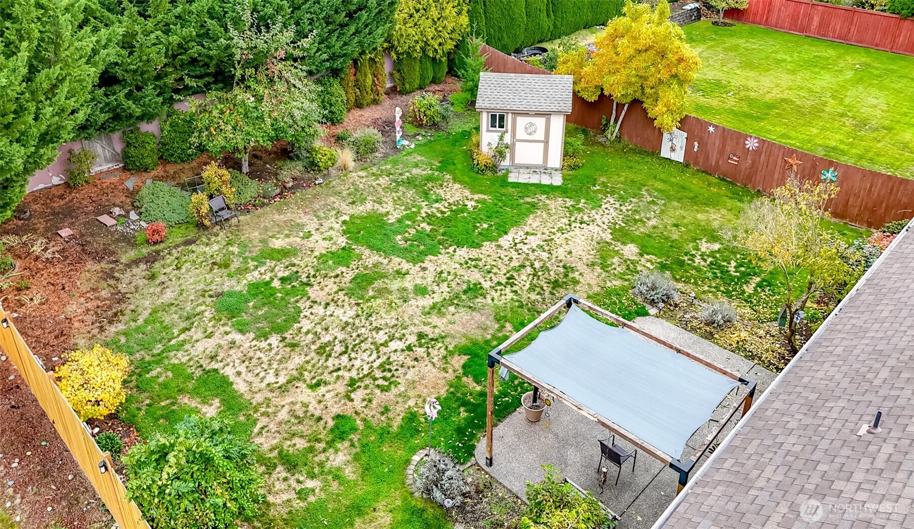 15405 148th Ave Court East Orting, WA 98360 - Photo 29 of 39 an aerial view of a house with a yard