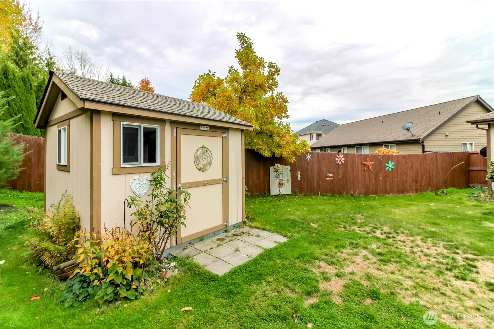 15405 148th Ave Court East Orting, WA 98360 - Photo 31 of 39 a view of a house with yard and a garden