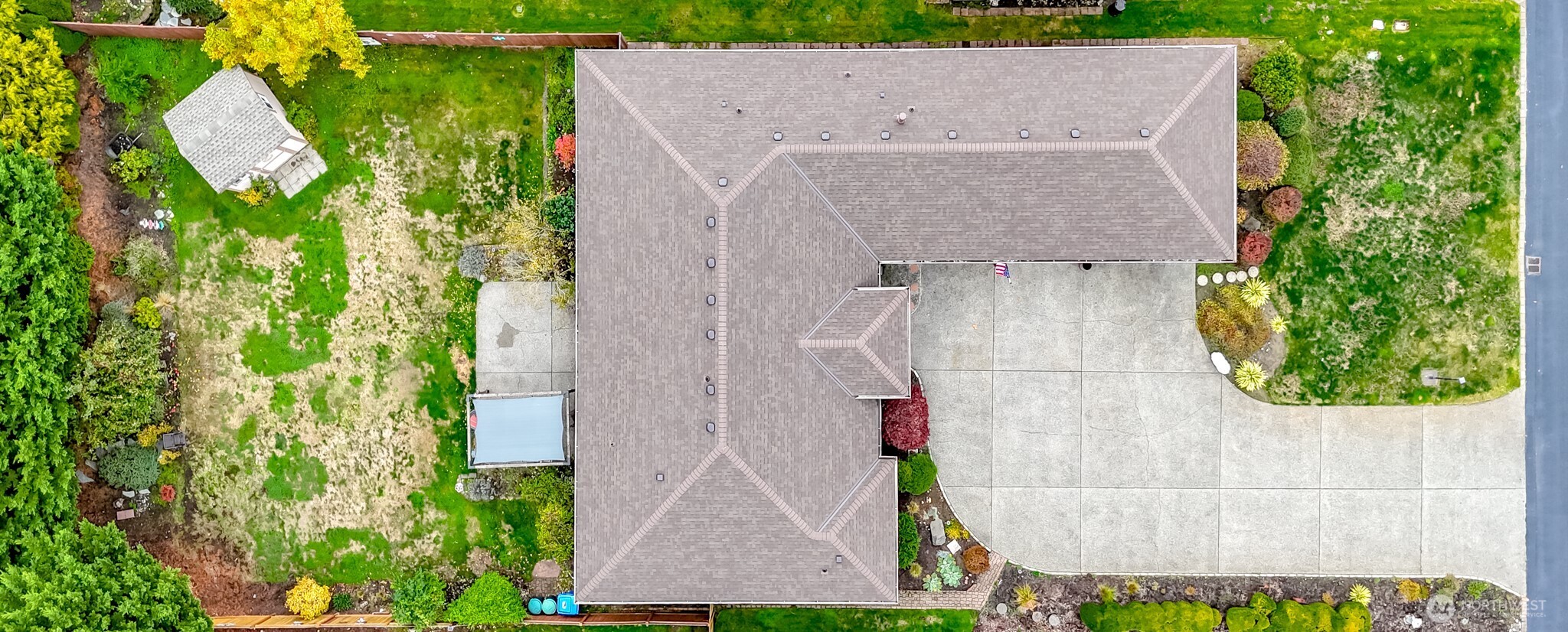 15405 148th Ave Court East Orting, WA 98360 - Photo 33 of 39 an aerial view of a house with a backyard