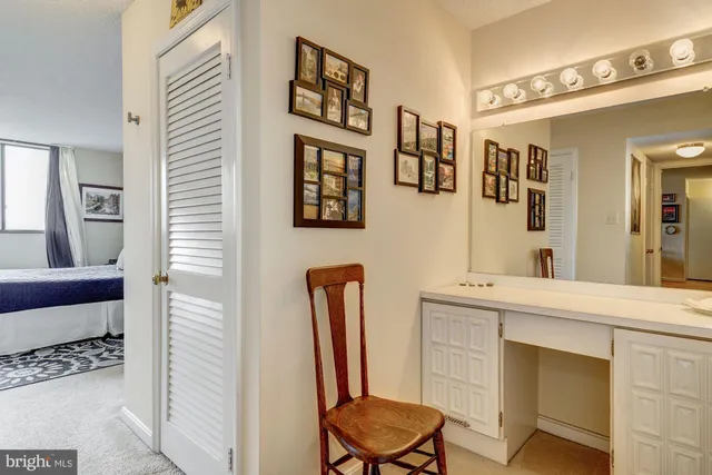 a bathroom with a sink a mirror and a toilet