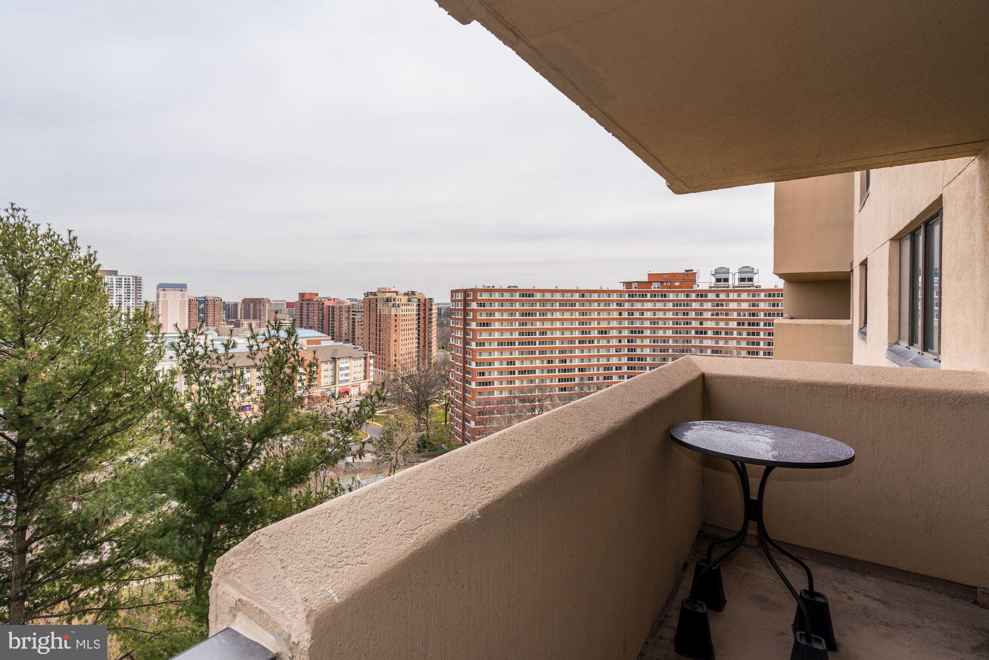 1101 South Arlington Ridge Road, Unit 704 Arlington, VA 22202 - Photo 30 of 41 a view of a city from a balcony