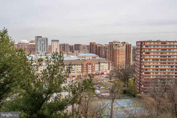 a view of a city with tall buildings