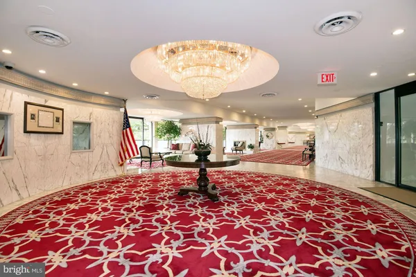 a very nice looking room with a large mirror