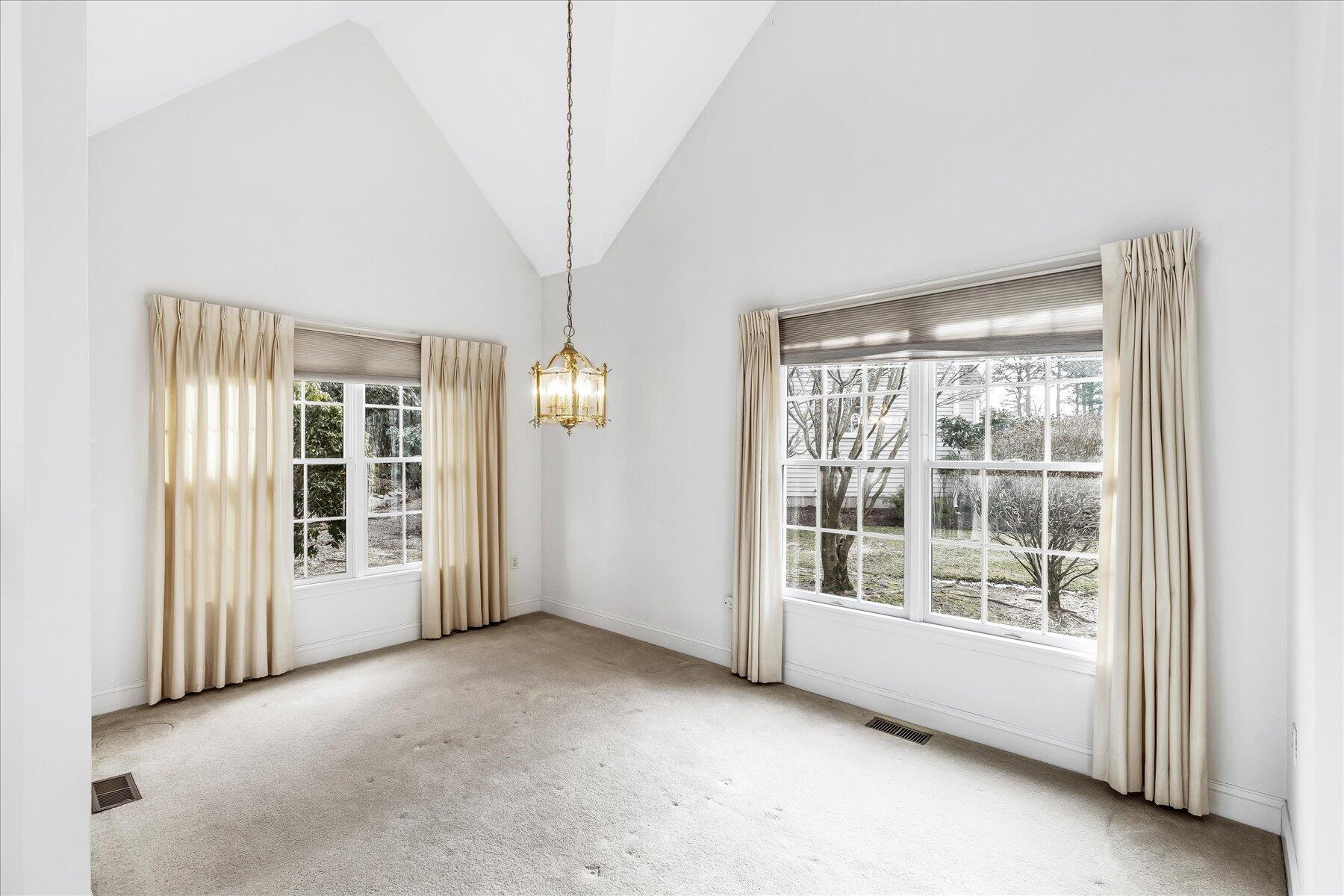 14 Bishops Park Mashpee, MA 02649 - Photo 18 of 42 a view of an empty room with a window